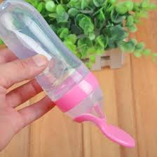 Cuillère chargeur de bouteilles en silicone